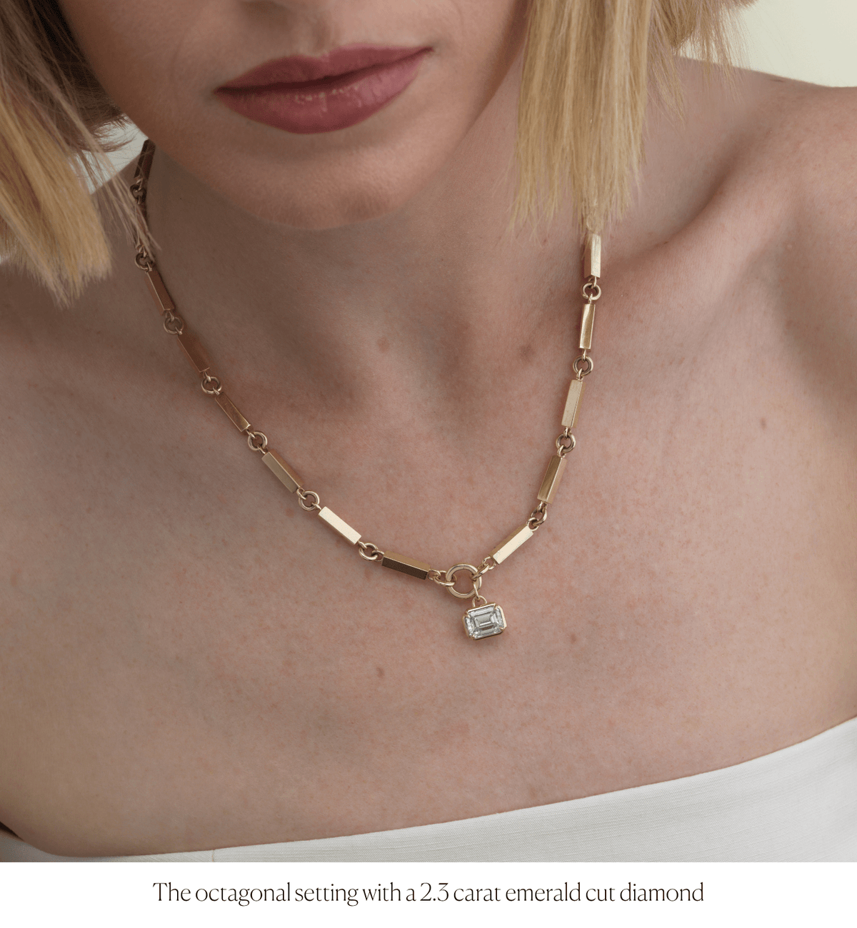 14k solid gold Signature Diamond Charm with a signature-cut diamond
