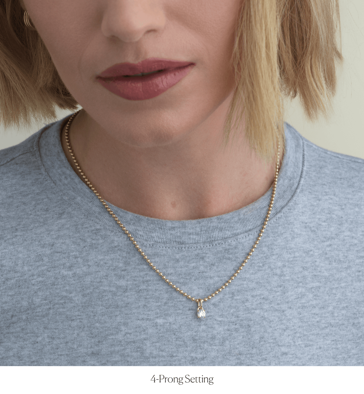 14k solid gold Signature Diamond Charm with a signature-cut diamond