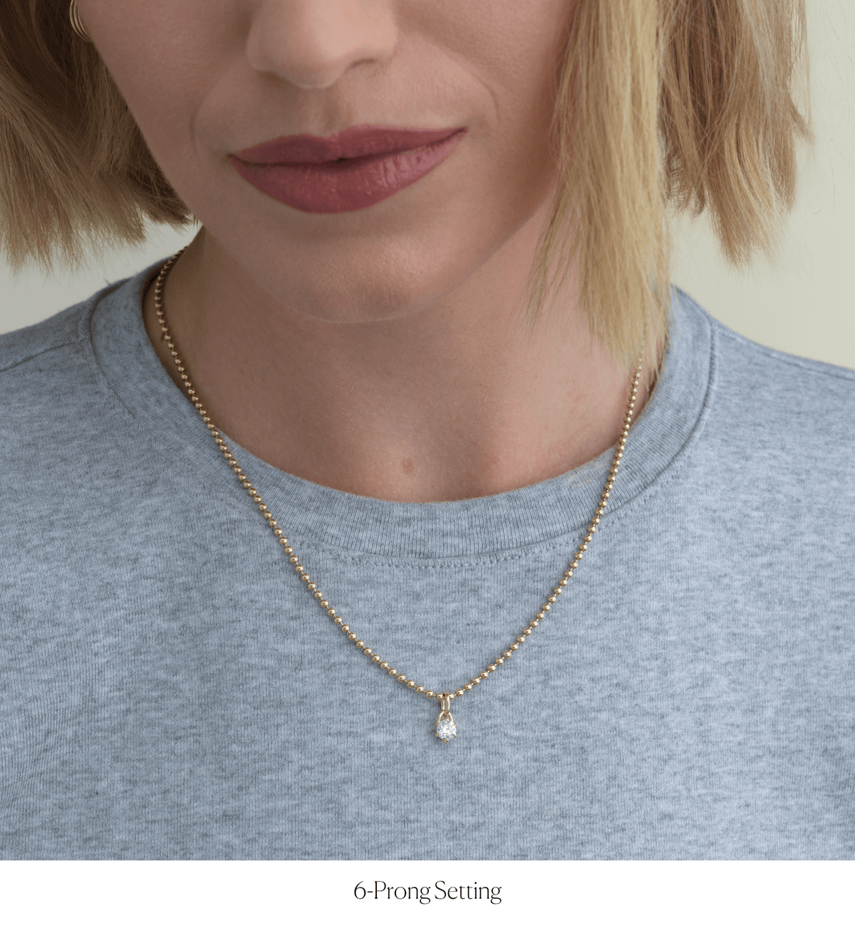 14k solid gold Signature Diamond Charm with a signature-cut diamond