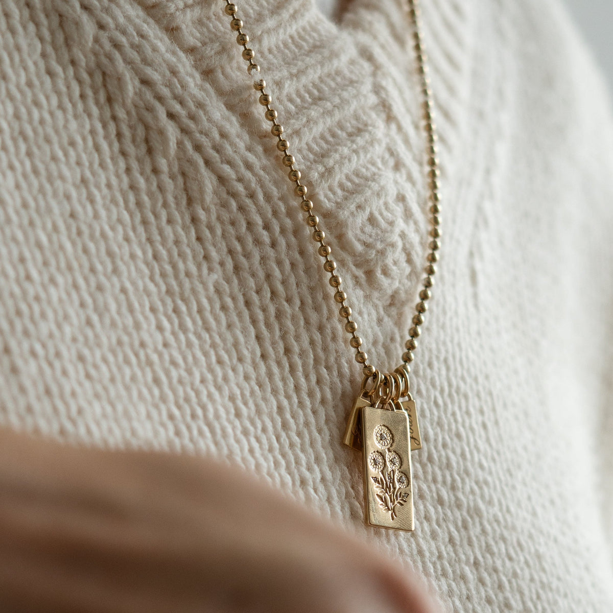 14k solid gold Birth Month Flower Charm with a birth-month flower motif