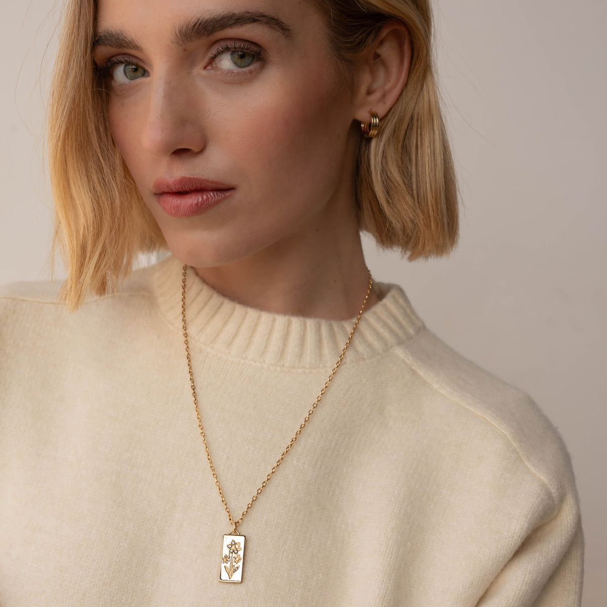 14k solid gold Birth Month Flower Charm with a birth-month flower motif