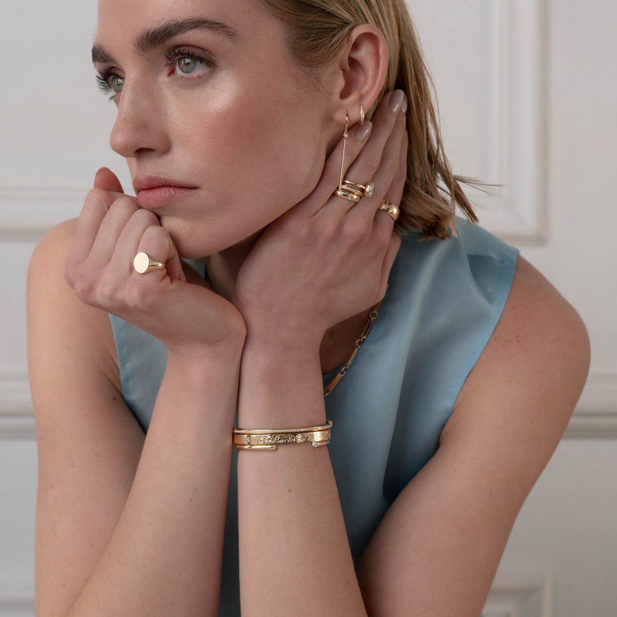 14k solid gold Signature Diamond Bangle with diamonds and a safety latch