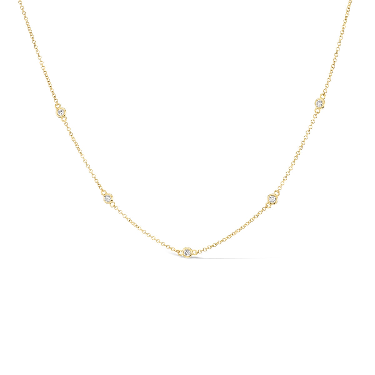 14k solid gold In Line Diamond Necklace with diamonds spaced along the chain