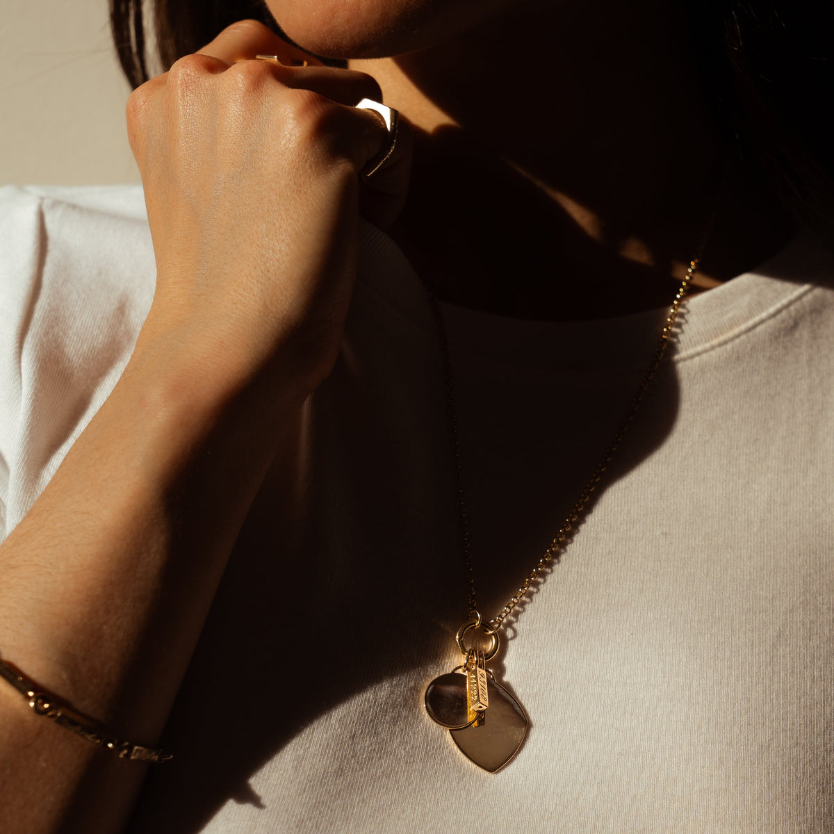 14k solid gold engravable Butter Charm with a smooth bar pendant