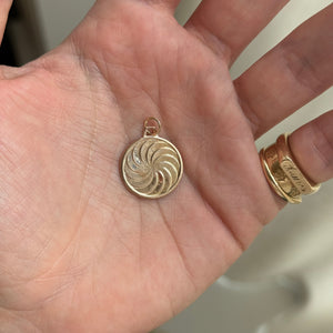 Vintage Aquarius Charm with Spiral Design on Back