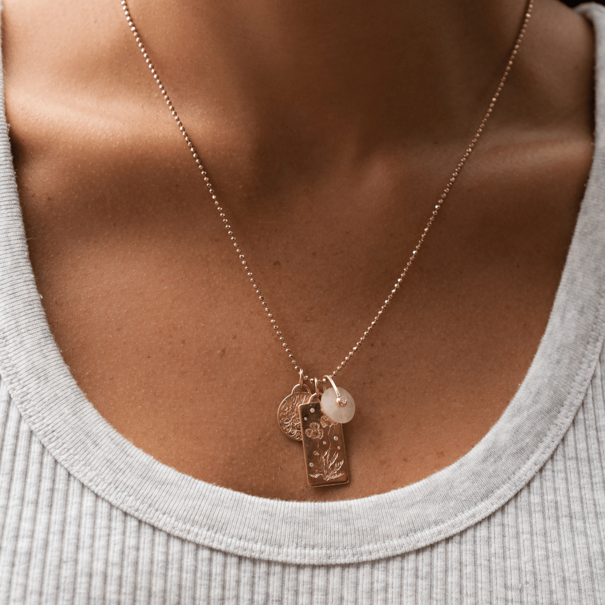 14k solid gold Custom Rock Charm as an organic rock-shaped charm