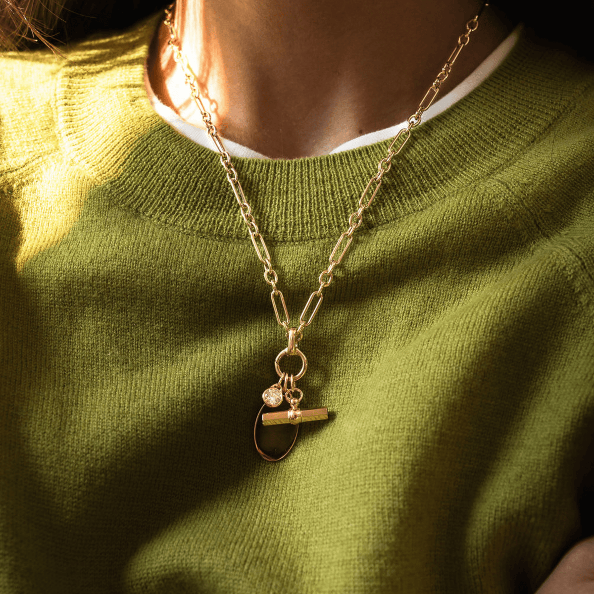 14k solid gold Toggle Charm with a toggle clasp design
