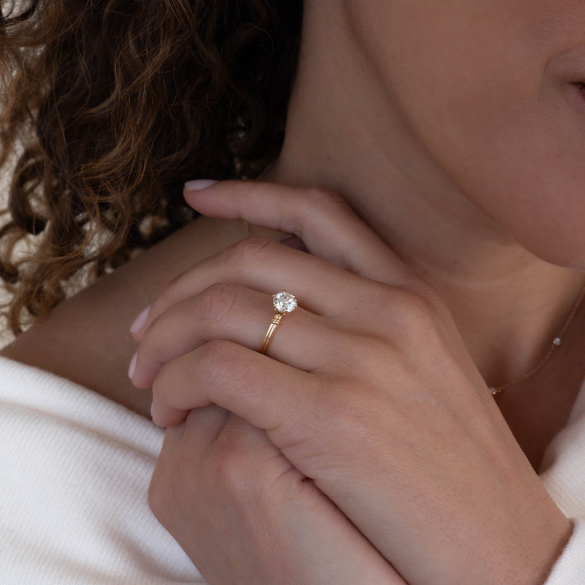 14k solid gold Lover's Knot engagement ring with an interlocking knot design