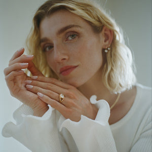 A fully customizable engagement ring with natural or lab grown diamonds with a split shank made in solid gold