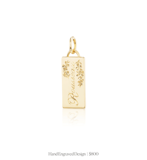 Hand engraved design on the 14k solid gold rectangle charm