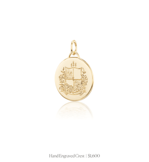 Hand engraved crest on the 14k solid gold circle charm