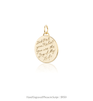 Hand engraved phrase in script on the 14k solid gold circle charm