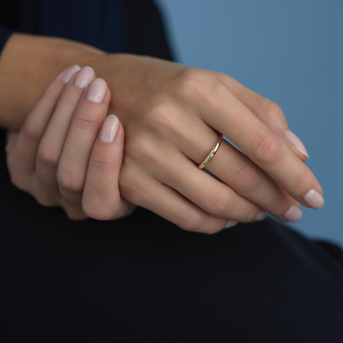 14k solid gold Mar Ring with a domed star-set diamond