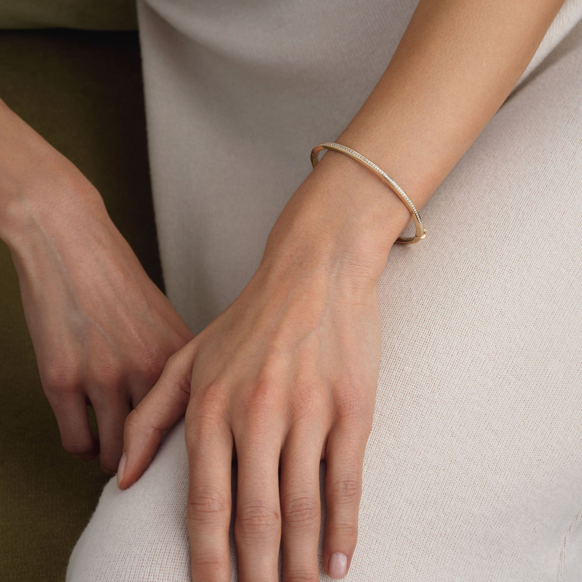 14k solid gold Signature Diamond Bangle with diamonds and a safety latch