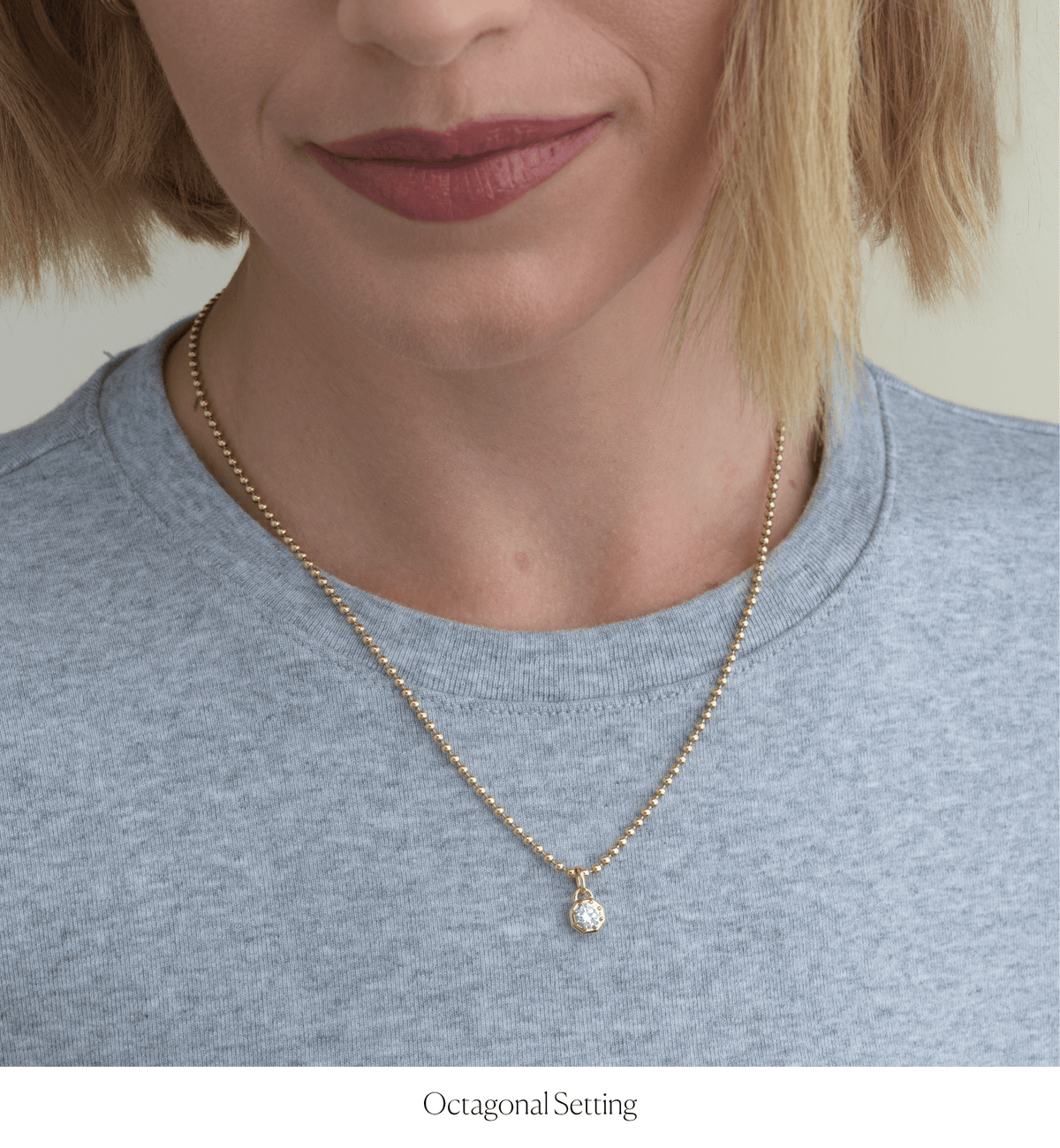 14k solid gold Signature Diamond Charm with a signature-cut diamond