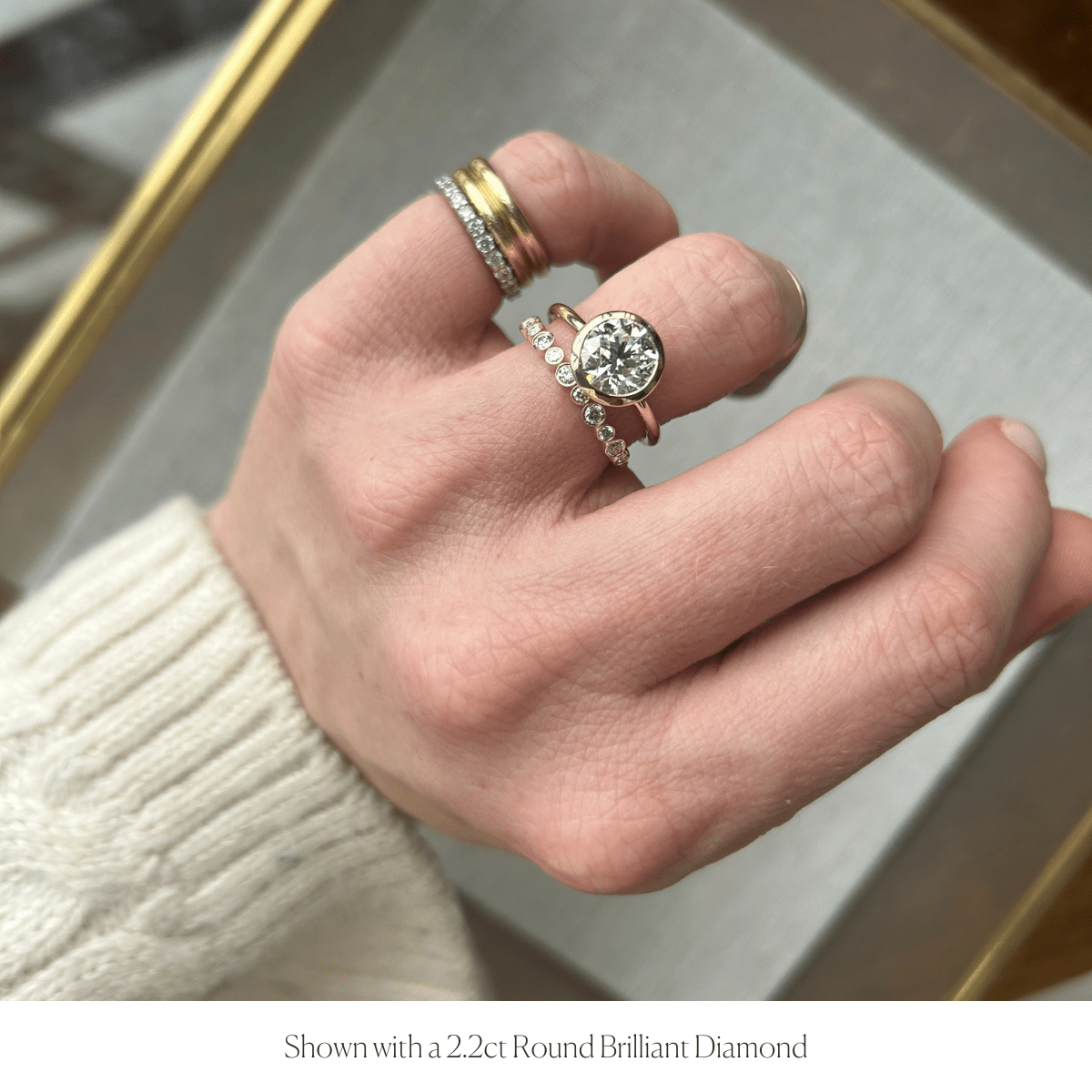 14k solid gold Open Bezel Solitaire engagement ring with an open-bezel diamond, shown open
