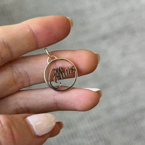 Video of 14k solid gold custom name "Collins" charm