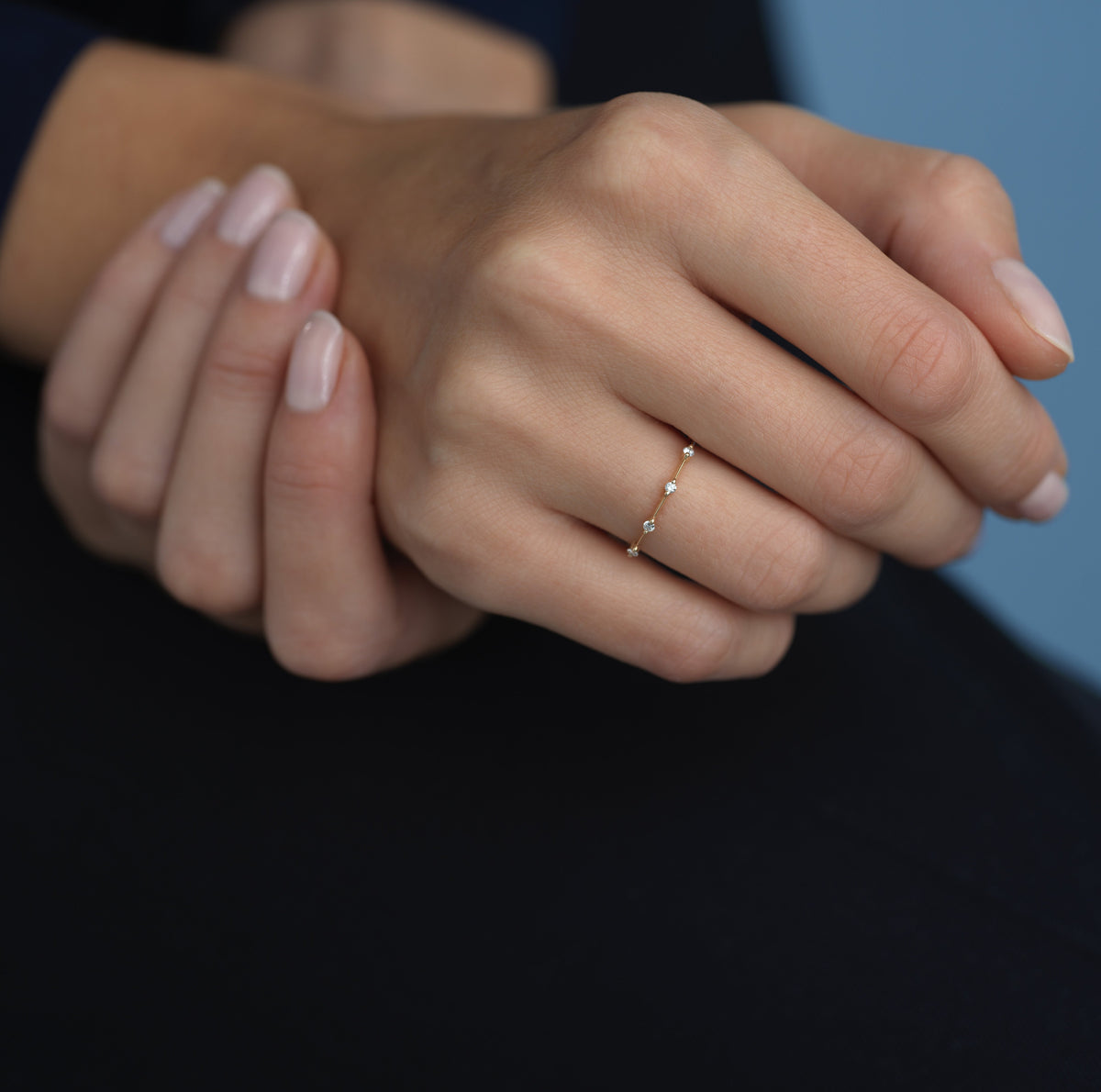 14k solid gold String Lights Ring with diamonds spaced along the band