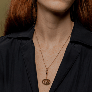 vintage number 18 gold charm