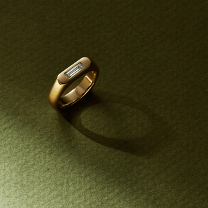 14k solid gold double sided straight signet-style ring with a baguette diamond and round diamond