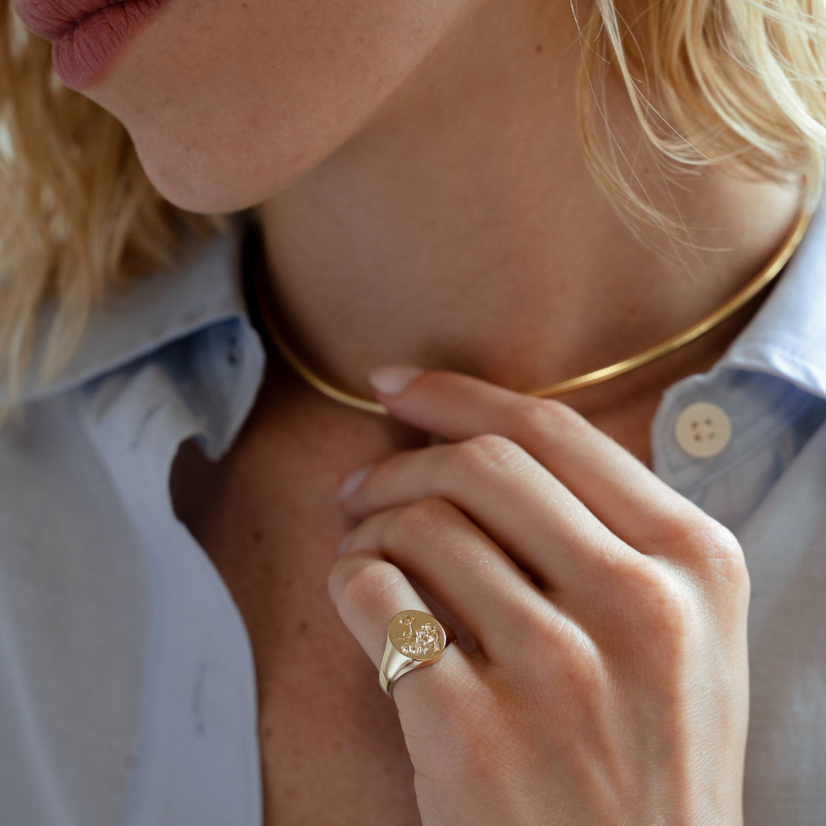 Custom hand engraved signets with artwork custom designed by you on a solid gold signet ring