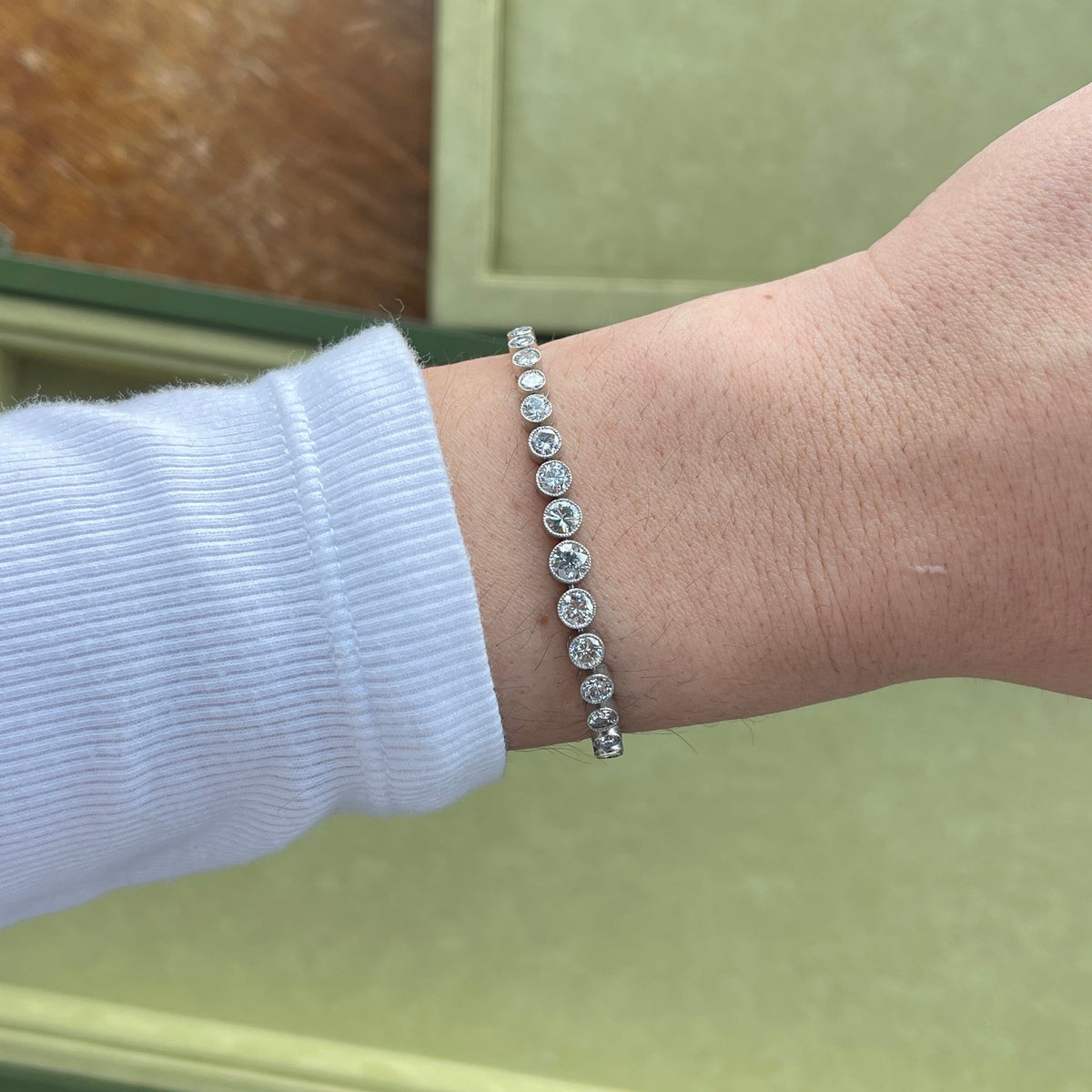 SOLD Vintage Platinum Graduated Tennis Bracelet