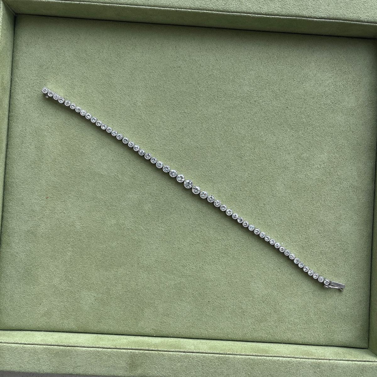 SOLD Vintage Platinum Graduated Tennis Bracelet