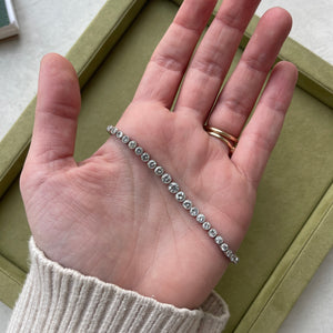 SOLD Vintage Platinum Graduated Tennis Bracelet