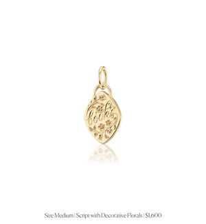 Solid gold charm with personalized hand engraving with script and decorative florals