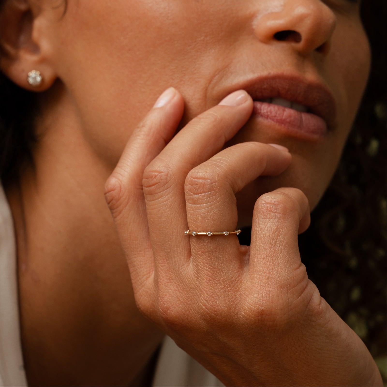 14k solid gold String Lights Ring with diamonds spaced along the band