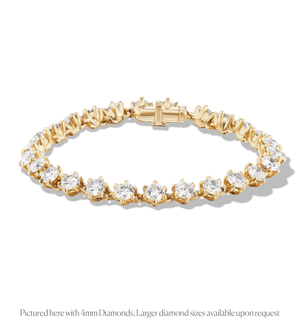 14k gold tennis bracelet with birdie-shaped links with 4mm diamonds