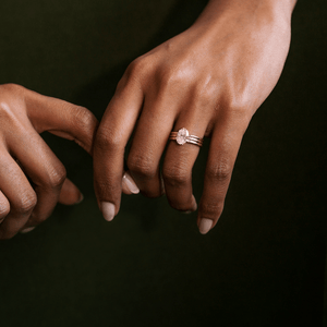 Model wearing the 14k gold triple band design engagement ring