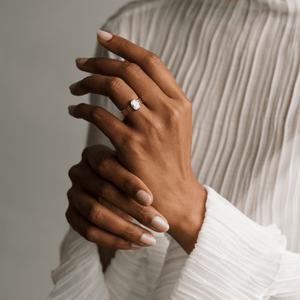 Model wearing the 14k gold triple band design engagement ring