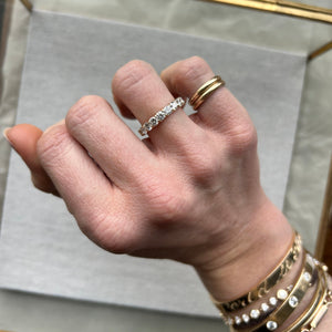 Model wearing 14k gold half eternity diamond ring