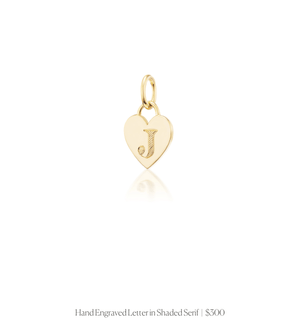 Hand engraved letter "J" in shaded serif font on the 14k solid gold heart charm