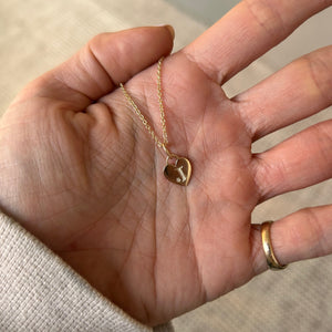 Hand engraved letter "J" in shaded serif font on the small 14k solid gold  heart charm