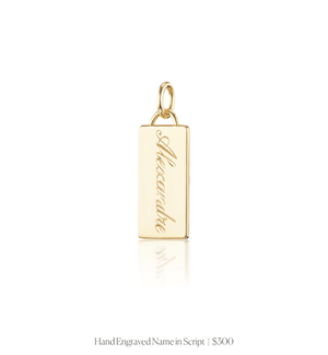 Hand engraved script name on the 14k solid gold rectangle charm 