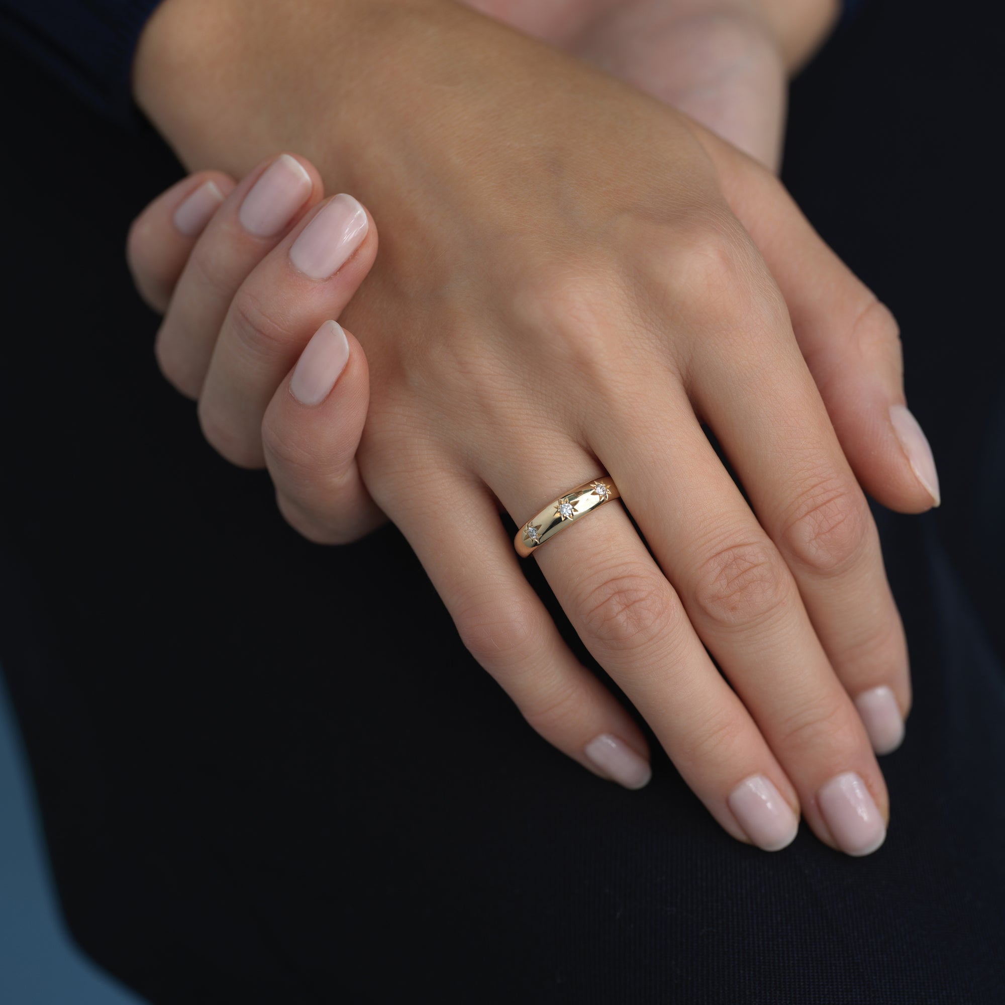 14k gold ring with three star-set diamonds