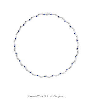 14k gold scalloped link tennis necklace with bezel set sapphires