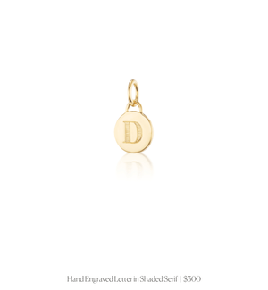 Hand engraved letter "D" in shaded serif on the 14k solid gold engravable circle charm