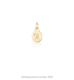 Hand engraved "R" in script font on the 14k solid gold circle charm