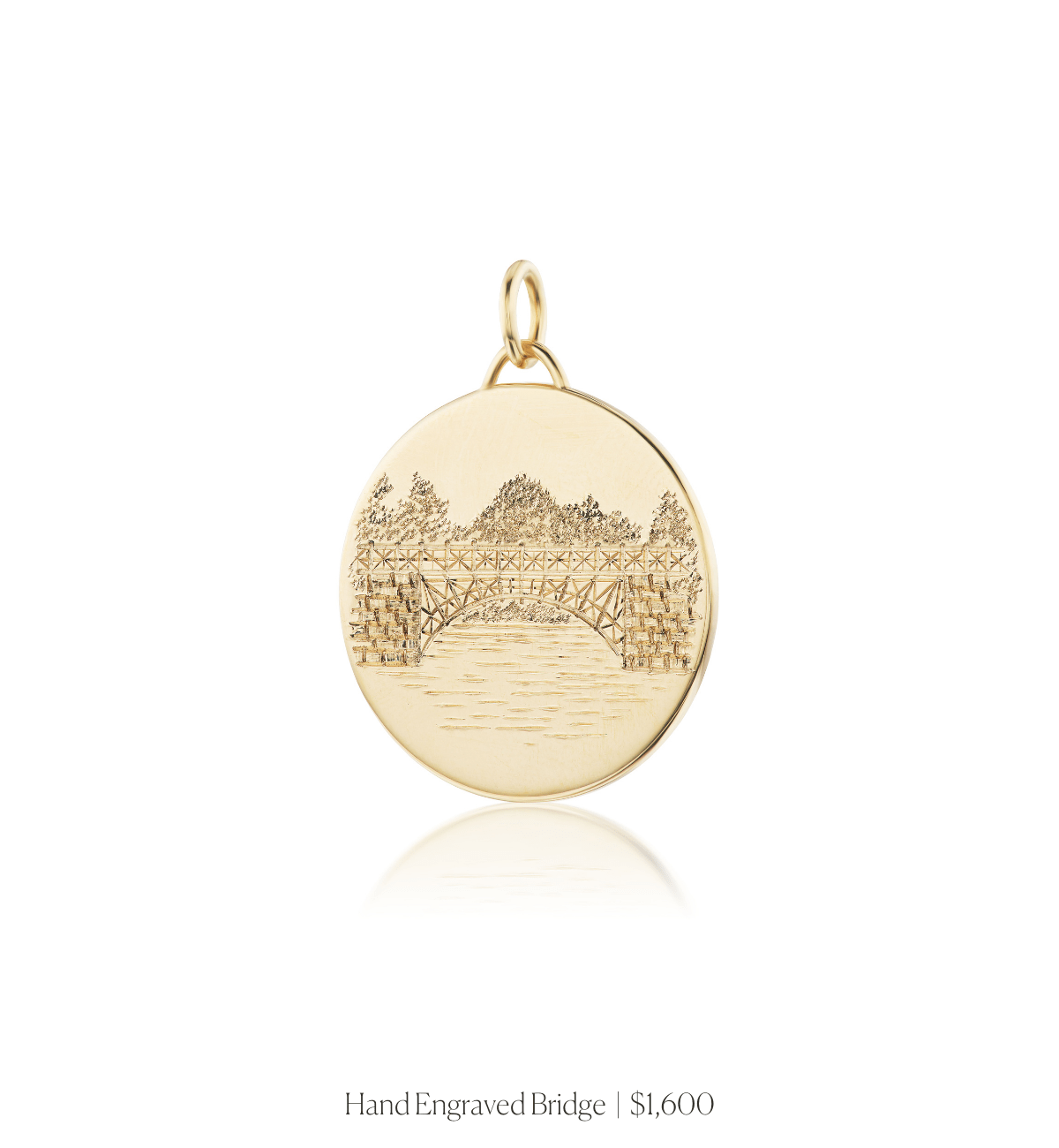 Hand engraved image of a bridge on the 14k solid gold circle charm