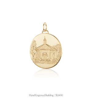 Hand engraved image of a building on the 14k solid gold circle charm