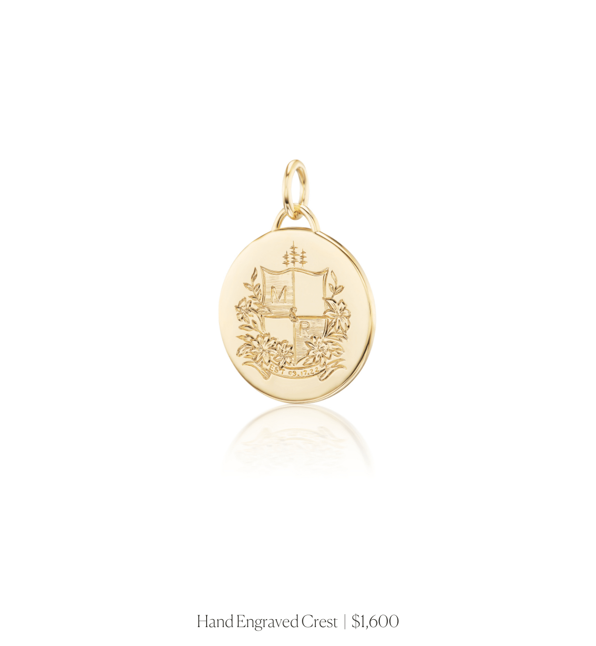 Hand engraved crest on the 14k solid gold circle charm