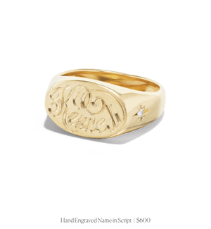 Hand engraved name "Kennedi" in script on 14k solid gold oval signet ring with two star-set diamonds