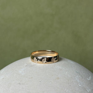 14k gold ring with Ginkgo leaf imprints across the band