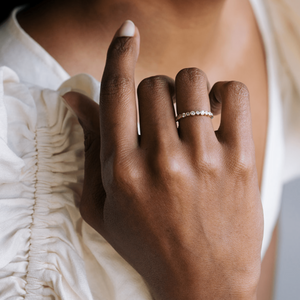 Model wearing 14k gold bezel set diamond ring