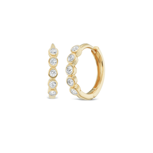 14k gold petite bezel set diamond huggie earrings