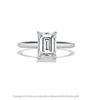 14k white gold solitaire engagement ring with an emerald cut diamond