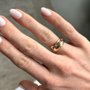 Model wearing the unisex 14k solid gold band engravable band stacked with the String Lights Ring